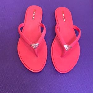 Pink Prada flip flops